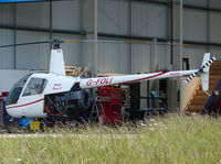 G-FOLI @ EGBO - Robinson R22 Beta - by Robert Beaver