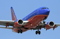 N481WN @ LAX - Southwest Airlines N481WN (FLT SWA1845) from Phoenix Sky Harbor Int'l (KPHX) on final approach to RWY 24R.