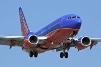N202WN @ LAX - Southwest Airlines N202WN (FLT SWA2748) from Reno Tahoe Int'l (KRNO) on final approach to RWY 24R.