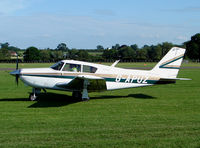 G-APUZ @ EGWC - Piper PA-24 250 Comanche - by Robert Beaver