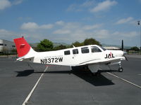 N8372W @ APC - Japan Air Lines/IASCO 2004 Beech A36 trainer in new colors @ Napa County Airport, CA - by Steve Nation