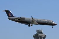 N924SW @ LAX - United Express (Sky West Airlines) N924SW (FLT SKW6522) from Phoenix Sky Harbor Int'l (KPHX) seconds from touchdown on RWY 24R.