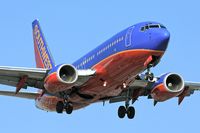 N486WN @ LAX - Southwest Airlines N486WN (FLT SWA988) from Metropolitan Oakland Int'l (KOAK) on final approach to RWY 24R.
