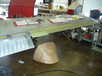 N8226E @ KJVL - Beech T-34B project  Right aileron installed - by Mark Pasqualino