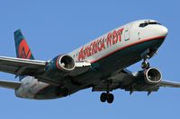 N308AW @ LAX - America West N308AW (FLT AWE708) from Phoenix Sky Harbor Int'l (KPHX) on final approach to RWY 24R).