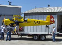 N131J @ SZP - 1962 Bucker Jungmann C.A.S.A. 1.131, unloading sequence 1, wing sections already unloaded - by Doug Robertson