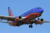 N718SW @ LAX - Southwest Airlines N718SW (FLT SWA988) from Metropolitan Oakland Int'l (KOAK) on final approach to RWY 24R.