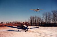 N94888 @ WI28 - 1949 415-G Ercoupe Club-Air on the ground with Taylorcraft N43296 on final approach - by JD