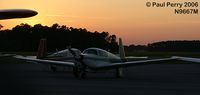 N9667M @ ECG - Can't beat a sunset at an airport