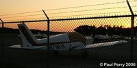 N71SA @ ECG - Sunset and a faraway ranging registration.  Who can resist? - by Paul Perry