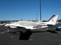 N214KP @ PAO - Red Sea Group LLC 1999 Raytheon Aircraft 58 with cockpit cover @ Palo Alto Airport, CA - by Steve Nation