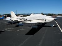 N180BZ @ PAO - Bravo Zulu Ventures 2003 Cirrus Design SR22 with 'Century of Flight' tail logo and cockpit cover @ Palo Alto Airport, CA - by Steve Nation
