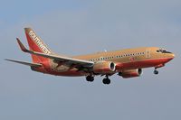 N750SA @ LAX - Southwest Airlines N750SA (FLT SWA988) from Metropolitan Oakland Int'l (KOAK) on final approach to RWY 24R.