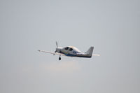 N404TX @ PDK - Needs to get the last gear up! - by Michael Martin