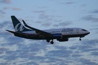 N284AT @ LAX - Air Tran Airways N284AT (FLT TRS43) from Hartsfield Jackson Atlanta Int'l (KATL) on short-final to RWY 24L in the final minutes of light.