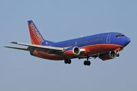 N304SW @ LAX - Southwest Airlines N304SW (FLT SWA2025) from Las Vegas McCarran Int'l (KLAS) on final approach to RWY 24R.