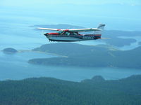 N8080G @ TIW - Over San Juans from R2 - by John Franich