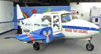 C-FNTE - This classic Piper Apache is now a children's plaything in New Jersey. A small plaque behind the rudder identifies the serial number of this aircraft. - by Daniel L. Berek