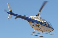 N58140 - Taking tourists for a 3 minute flight over Hoover dam. - by Michael W. Rosa