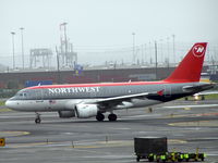 N328NB @ EWR - on a rainy day at EWR - by Uri Dotan Bochner