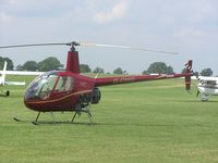 G-CHIS @ EGBK - Robinson R-22 Beta in smart maroon/gold colours - by Simon Palmer