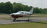N5358W @ SMQ - Just in from Delaware, this sleek Piper PA-46-350P Malibu Mirage glides in to her  space on the apron at Somerset County Airport. - by Daniel L. Berek