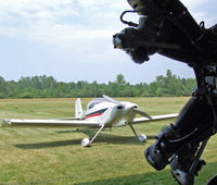 N747WX @ D51 - RV-6 framed by old Kinner Engine