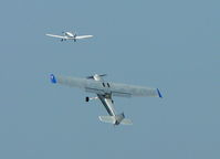 N9929G @ MQI - Picking Up a Banner - by Scott Albright