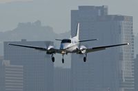 N3262R @ SMO - 1999 Raytheon King Air C90A N3262R from Monterey Peninsula (KMRY) on final approach to RWY 21 at Santa Monica Municipal Airport (KSMO) - Santa Monica, California.