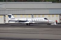 N299SC @ SMO - 1997 Learjet 60 N299SC being towed to the business jet terminal at Santa Monical Municipal Airport (KSMO) - Santa Monica, California.
