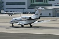 N978QS @ SMO - 2002 Cessna 750 Citation X N978QS, from Las Vegas McCarran Int'l (KLAS), on the brakes after landing on RWY 21.