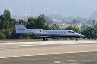 N254FX @ SMO - 2002 Bombardier Learjet 60 N254FX taxiing onto RWY 21 in preparation for departure to Metropolitan Oakland Int'l (KOAK).