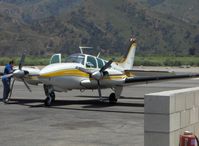 N680RM @ SZP - 1966 Beech 95-C55 BARON, two Continental IO-520s 285 Hp, refueling - by Doug Robertson