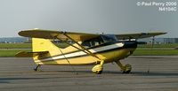N4104C @ ECG - Stinson on the ramp near dusk