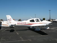 N540CD @ PAO - Perennial Aviation 2005 Cirrus Design SR22 in flaming colors on sunny Saturday afternoon @ Palo Alto Municipal Airport, CA - by Steve Nation