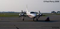 N7023Q @ ECG - Fresh in from a family trip, the bags still sitting near the port wing