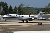 N64HH @ SMO - 2000 Bombardier Learjet 45 N64HH from Metropolitan Oakland Int'l (KOAK) landing on RWY 21. - by Dean Heald