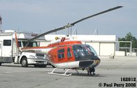 162812 @ NCA - TH-57, a fitting display at a large helo base