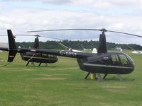 G-OPTF @ EGTB - Robinson R44 Raven at Booker - by Simon Palmer
