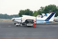 N2238G @ PDK - Tied down @ PDK with vairous AC in background - by Michael Martin