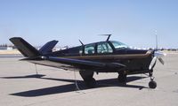 N50Z @ CCR - Unusual black and gold Bonanza - by Bill Larkins