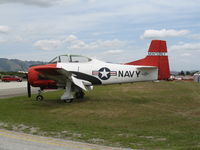 N752WW @ WVI - 1954 North American T-28B (NX752WW) as (NAF) Monterey hack (BuAer 137752) @ Watsonville Municipal Airport, CA - by Steve Nation