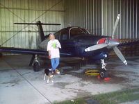 N2597U @ C81 - 97U hangared with owners daughter-in-law in frame - by Jim Teeters, Jr.