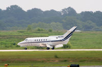 N613MC @ PDK - Landing Runway 2R - by Michael Martin
