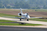 N986QS @ PDK - Execjet 986 taxing from Signature Flight Services - by Michael Martin