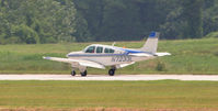N7233L @ PDK - Landing Runway 2R - by Michael Martin