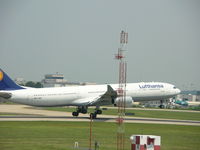 D-AIGO @ CLT - Touching down on runway 18R in CLT - by Damon Warren