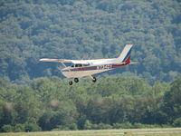 N734DY @ IPT - Just about to touch down.  I didn't get the landing because he went behind a building. - by Sam Andrews
