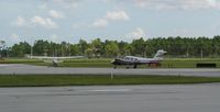 N3050H @ KTMB - Piper Seminole holding short 27R