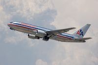 N322AA @ LAX - American Airlines N322AA (FLT AAL40) climbing out from RWY 25R enroute to John F Kennedy Int'l (KJFK). - by Dean Heald